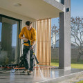 Can you wash a house with hot water pressure washer?