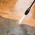 Are there any special considerations when using an adjustable speed feature on a powerwasher?
